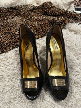 Michael Kors Black Peep-Toe Pumps with Gold Interior and Plate